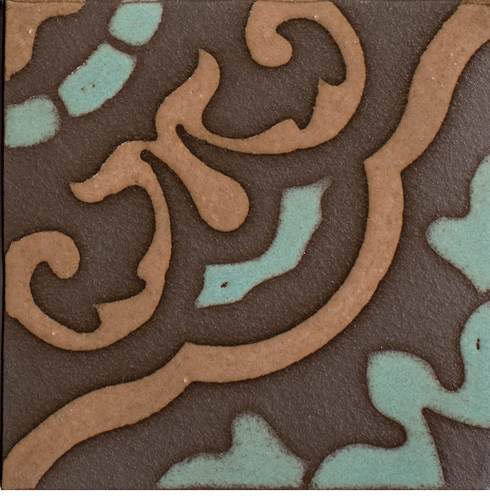 Decorative tile with brown and turquoise pattern